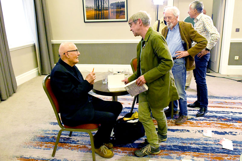 Signing the Collected Poems at the Finch launch May 2022